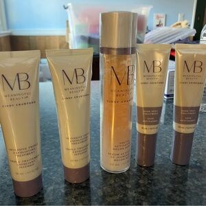 Meaningful Beauty Skincare Collection with Purple and Gold Accents